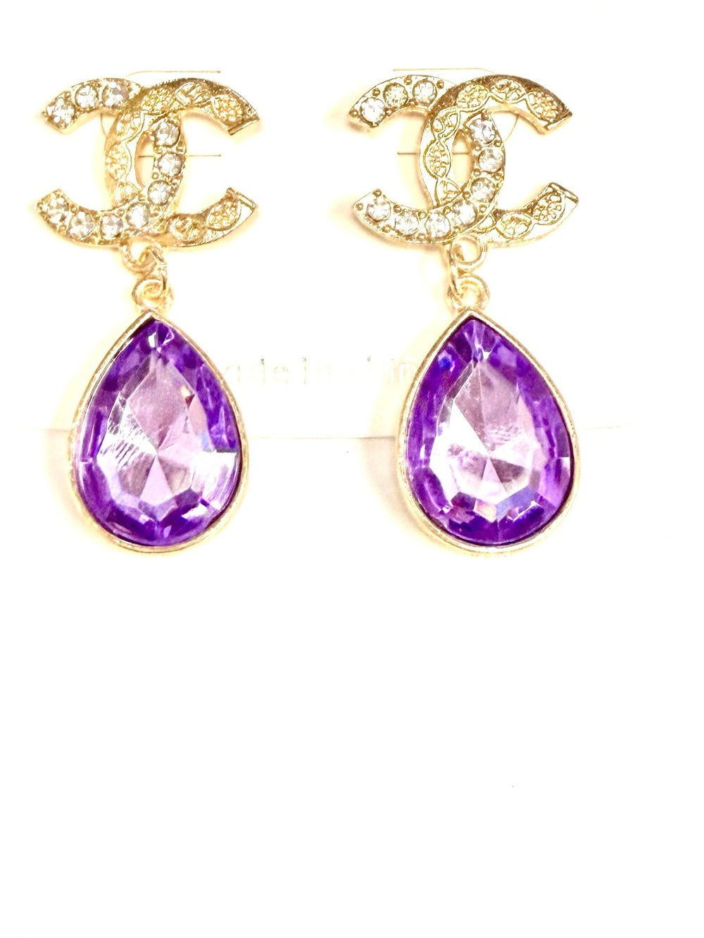 Classic and timeless Gold Logo Earrings with Purple Teardrops